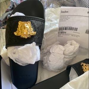 Black and gold Medusa head Versace sandals
